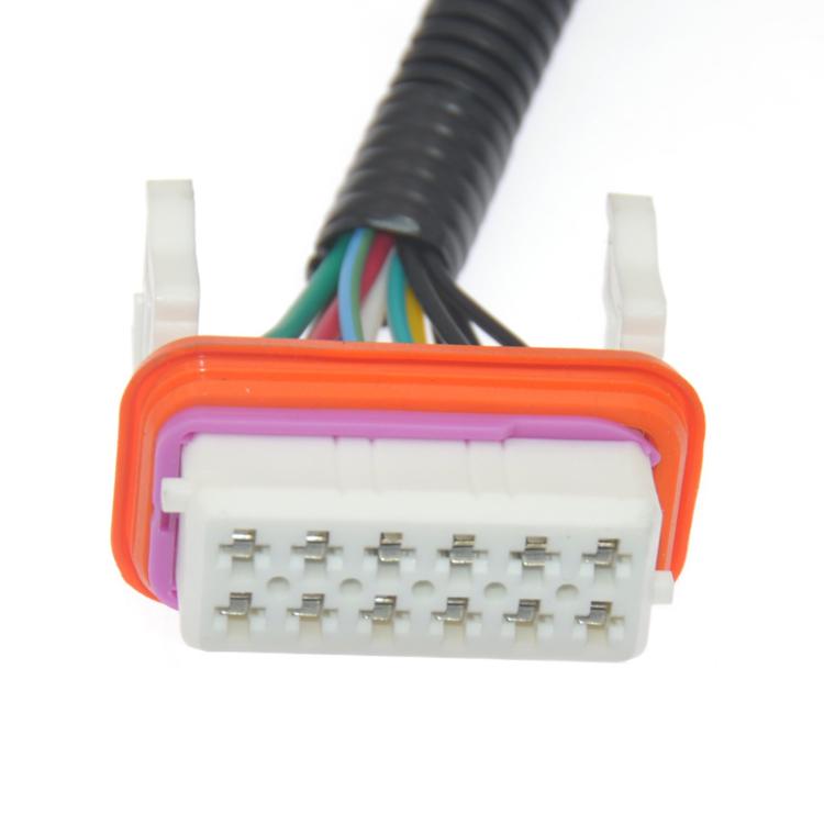HID headlight wiring harness multi-pin plug with orange housing and visible contacts