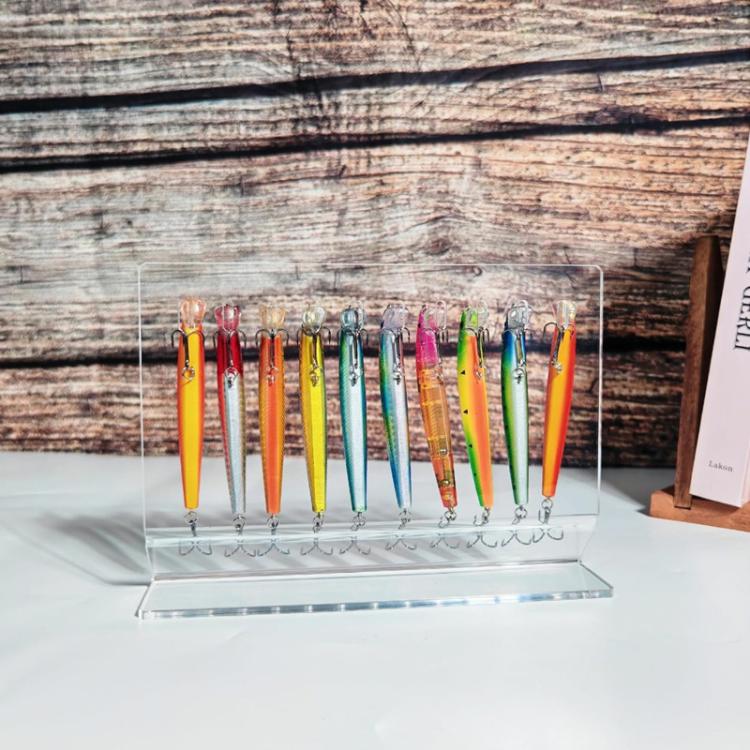 Clear acrylic lure organizer displaying multiple colorful fishing lures in slots
