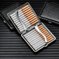 Open leather cigarette case showing rows of cigarettes with a metal spring clamp.