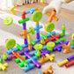 Children pipe building blocks set close-up of colorful pipe-wheel structures on mat