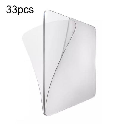 Transparent double-sided adhesive mounting pad with clear protective film