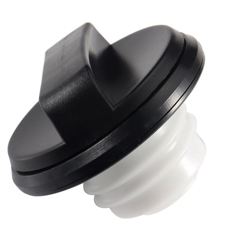 Black fuel tank cap with white inner insert and sealing ring