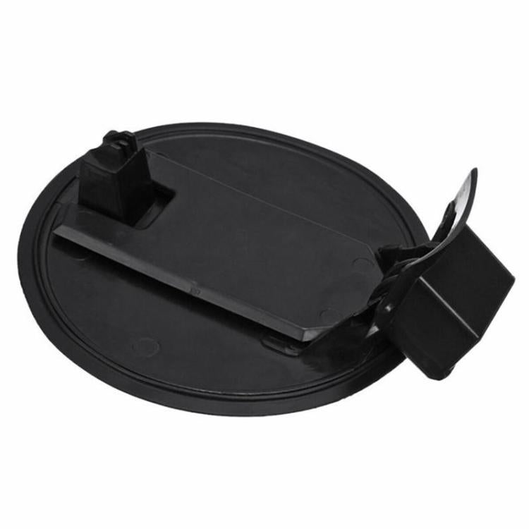 Black fuel tank filler flap with raised handle and hinge bracket