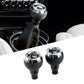 Set of black leather manual shift knobs with chrome tops and gear markings 2–6