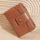 Brown compact zipper card wallet with multiple card slots and coin pocket