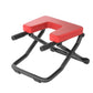 Foldable yoga inversion bench with red padded headrests and black anti-slip frame