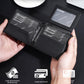 Men’s compact leather wallet opened in hands, showing card slots and a clear ID window