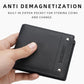 Black lychee-texture leather compact wallet held in hand with snap closure