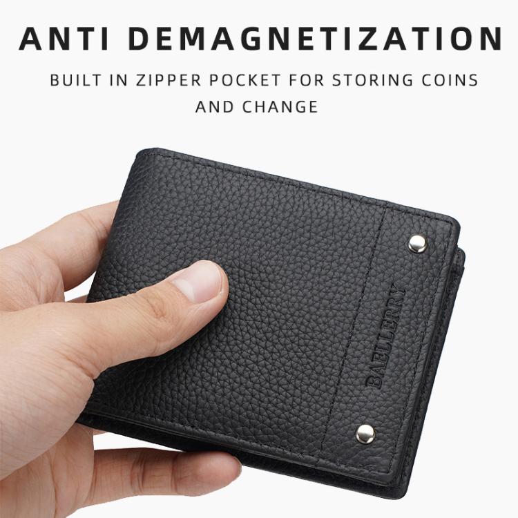 Black lychee-texture leather compact wallet held in hand with snap closure