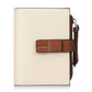Beige compact snap wallet with brown front tab and zipper coin pocket pull