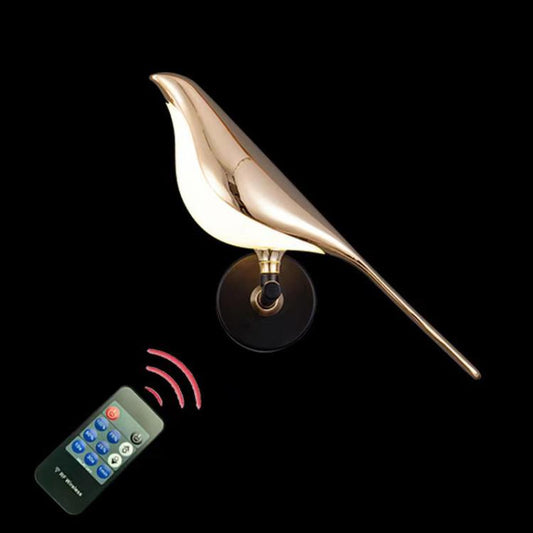 LED wall lamp with curved gold shade and round wall base, remote control shown