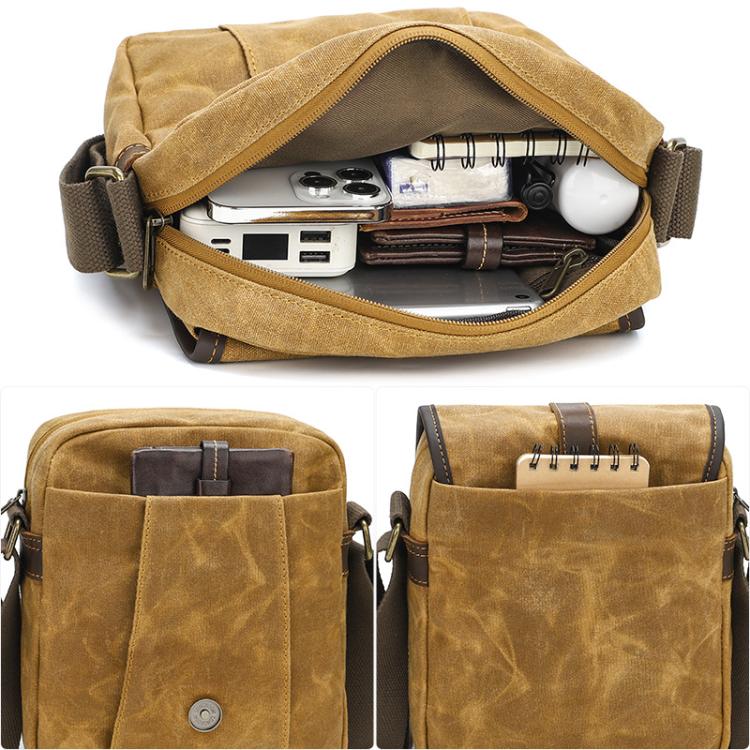 Dusty yellow waxed canvas crossbody bag with zipper top and interior pocket