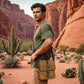 Dusty yellow waxed canvas crossbody messenger bag worn on model with leather buckle