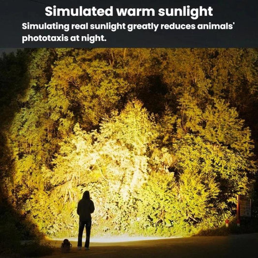 LED outdoor work light casting bright beam on nearby trees and ground