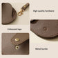 PU leather eyeglasses case details: embossed logo, metal buckle, and snap front
