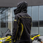 Black motorcycle rain suit hooded jacket with yellow trim and back vent