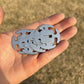 Stainless steel rope clip shown in hand, round latch fastener