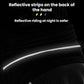 Black motorcycle gloves with reflective strip on back of hand