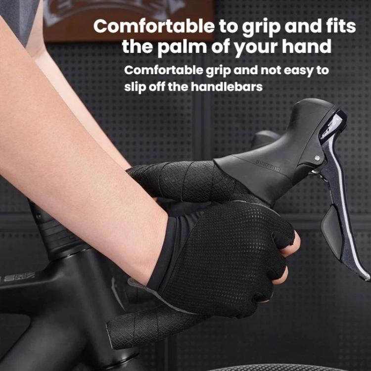 Bicycle handlebar with black textured wrap grip held by a gloved hand