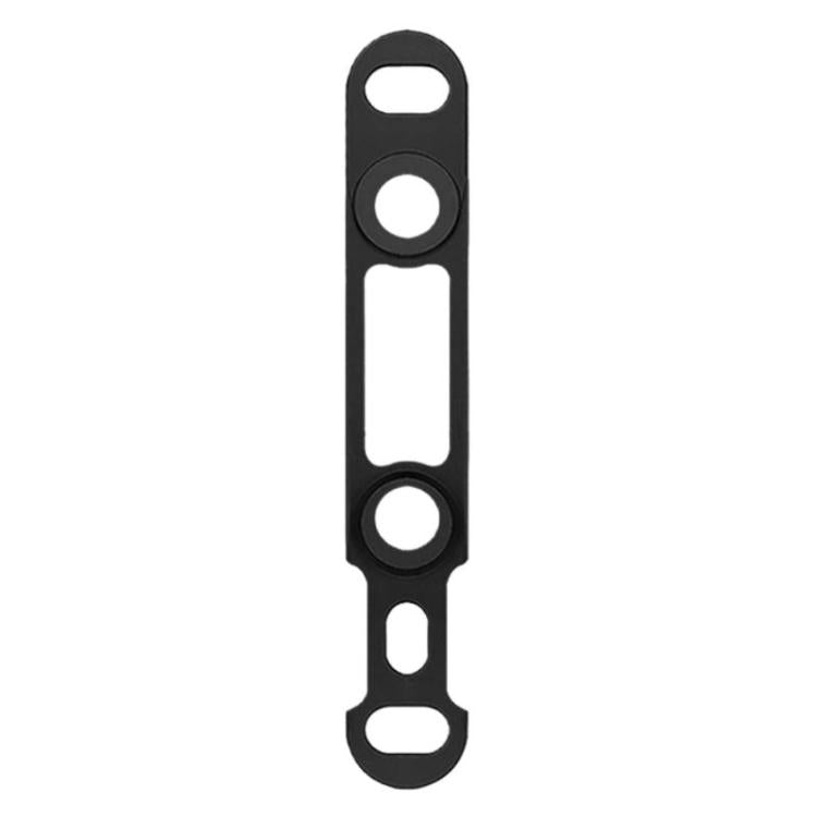 Road disc brake adapter in black with multiple bolt holes and center slot.