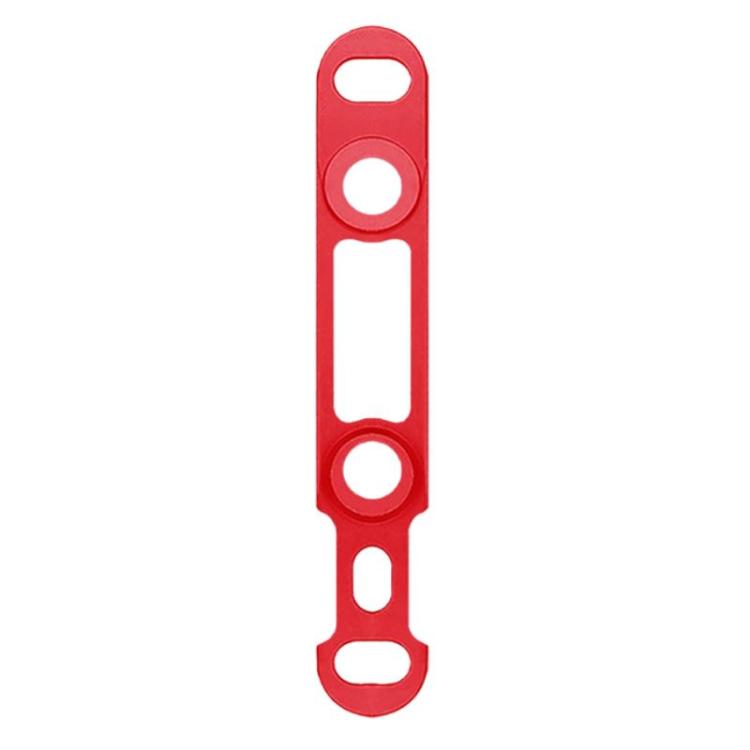Road disc brake adapter in red with multiple bolt holes and center slot.