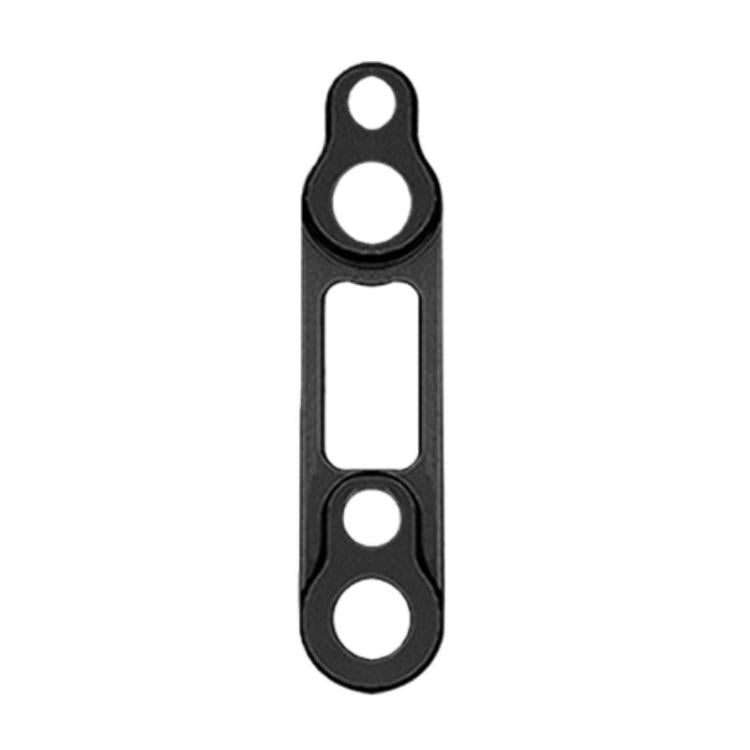 Road disc brake adapter in black with two large bolt holes and cutout.