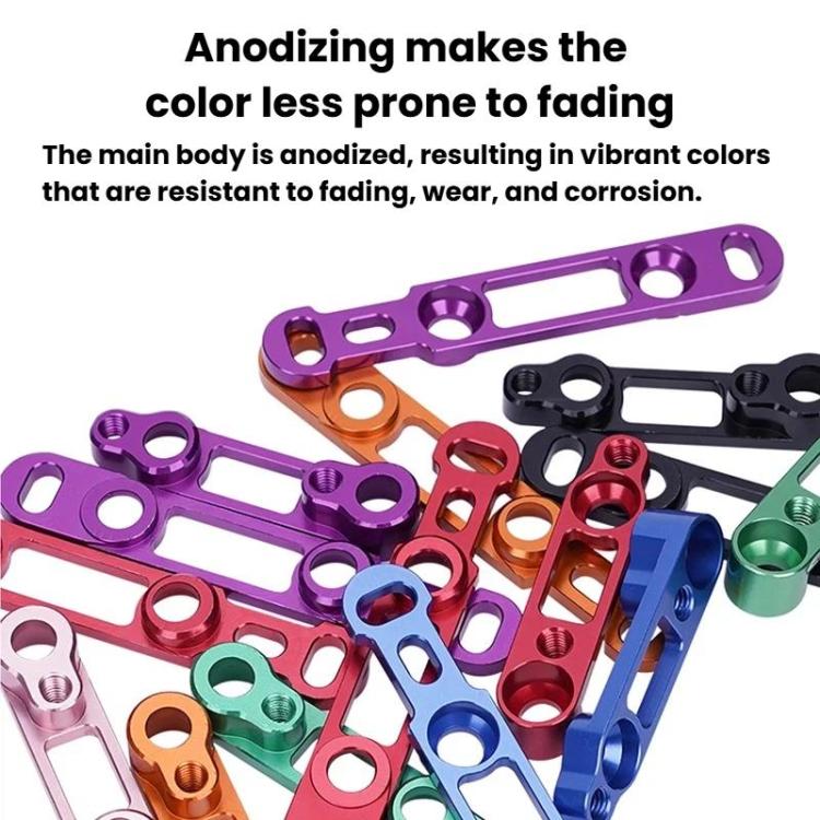 Assorted anodized road disc brake adapters with colorful clamp plates and mounting holes.