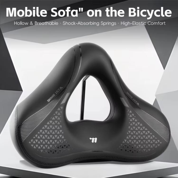 Black wide bike saddle with central hollow vent cutout and textured side panels