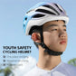 Youth cycling helmet in light blue and white worn by a child