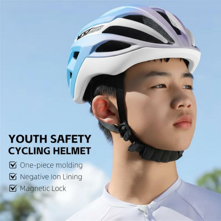 Youth cycling helmet in light blue and white worn by a child