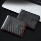 Men's carbon fiber card holder with orange edge lining, shown open with card slots