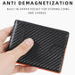 Men's carbon fiber ID card holder held in hand, slim profile with orange interior trim