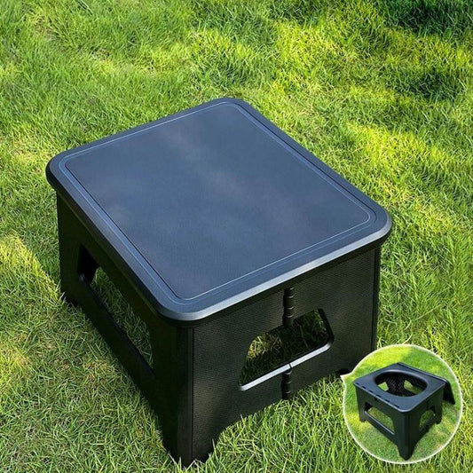 Large black portable camping toilet stool with square lid and cutout side panels