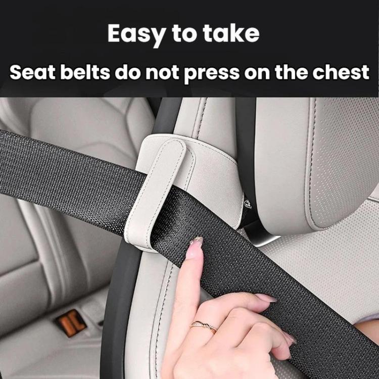 Car seat belt shoulder pad positioner in light beige/cream, padded strap cover on seat belt