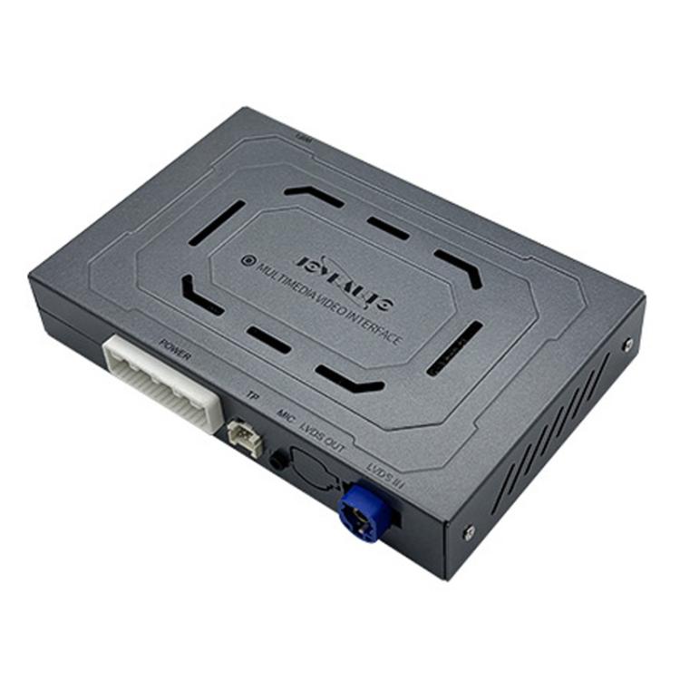 Wireless CarPlay module, dark gray box with visible input ports and cooling vents