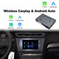 Wireless CarPlay module over car dashboard with infotainment screen showing apps