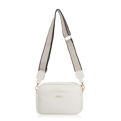 White square zippered crossbody pouch with adjustable web strap and gold-tone hardware.