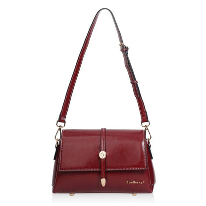 Red waxed leather small square crossbody bag with metal buckle and shoulder strap