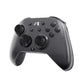 Grey mechanical game controller with dark thumbsticks and ABXY face buttons