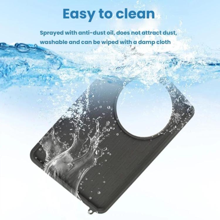 Grey silicone mat with water-splash finish, round cutout and ribbed surface