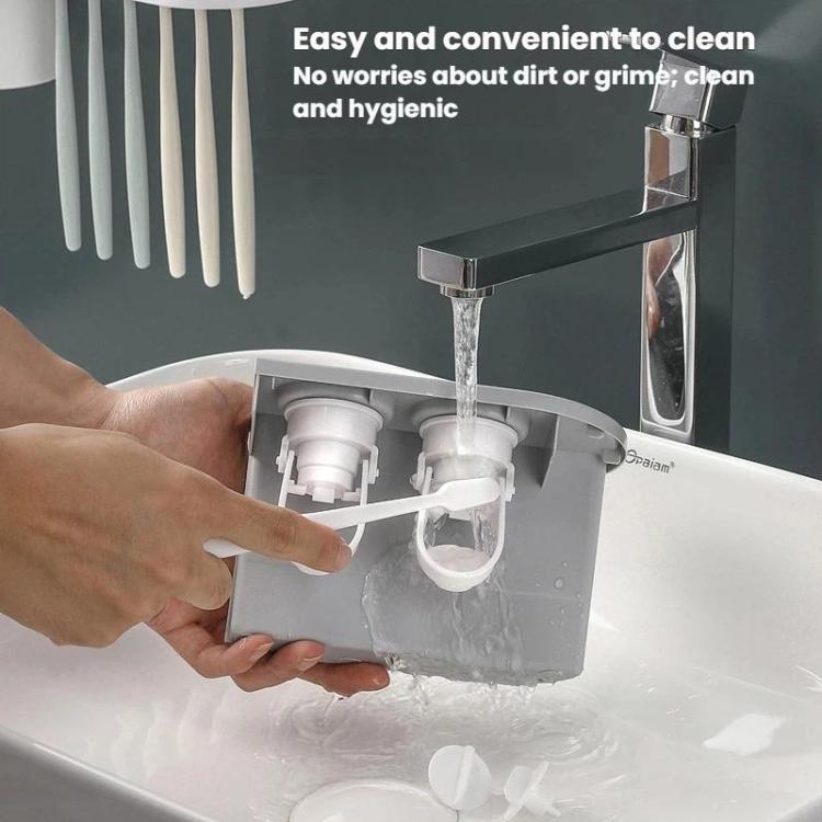 White wall-mounted toothbrush holder with detachable toothpaste tubes and mouthwash cup