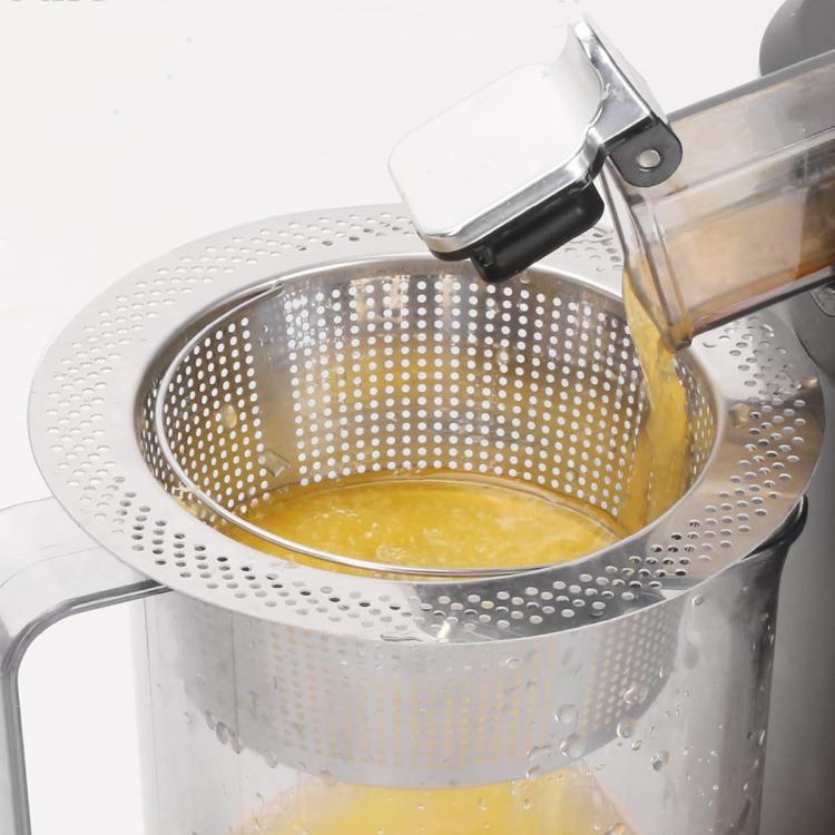 Stainless steel perforated cone strainer filter, with juice flowing through mesh