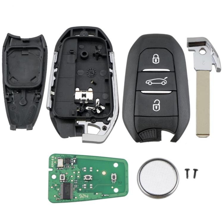 Assorted key fob parts: open shell, circuit board, remote back, spare key blade, screws
