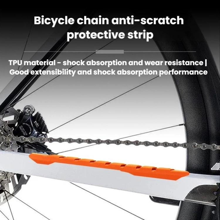 Orange bike chain anti-scratch protective strip on lower frame near chain