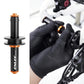 Bike chain keeper holder, black and orange cylinder shown being installed by gloved hands