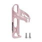 Pink plastic bike water bottle cage with open side and mounting screw holes