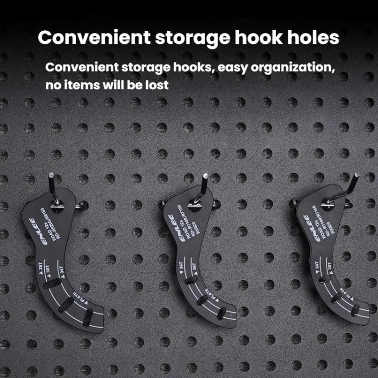 Black ENLEE adjustment gauge plates with storage hook holes on perforated pegboard