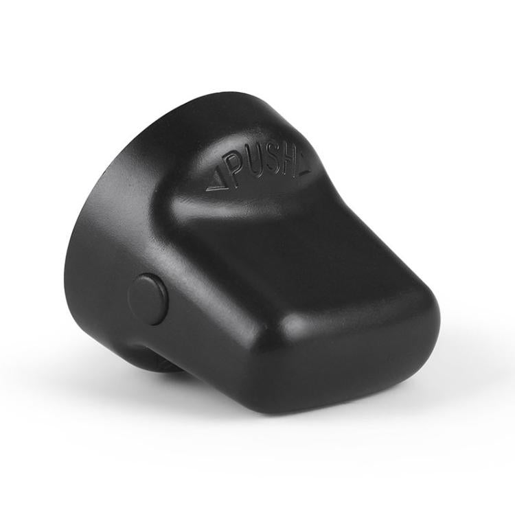 Black ignition switch knob cover with embossed PUSH marking and side release tab