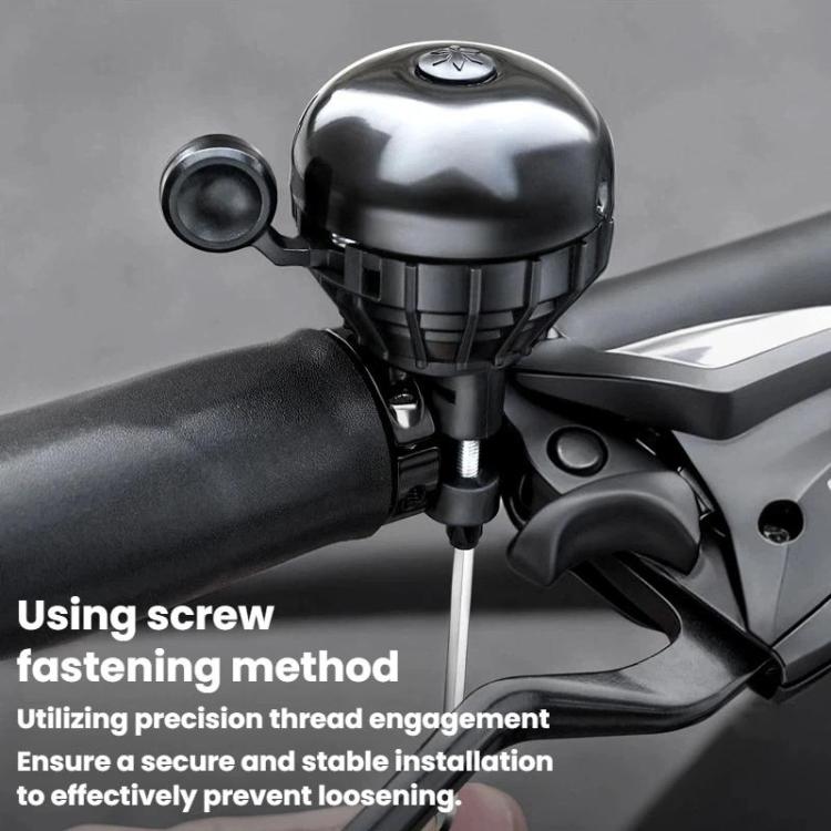 Silver bike thumb bell mounted on a handlebar with side button