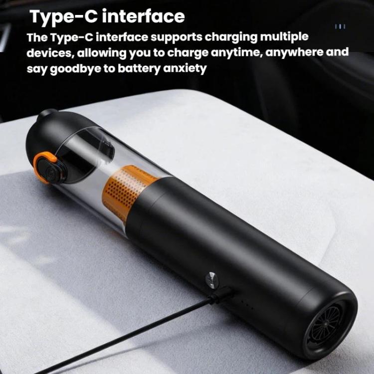 Black handheld cordless vacuum cleaner lying down with orange air intake port